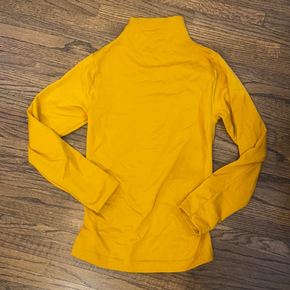 Yellow turtle neck